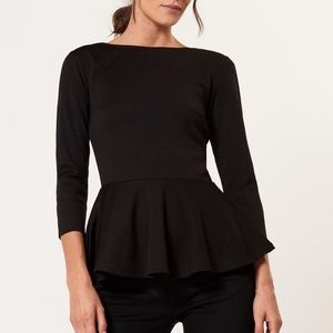 Cute black top with a heart zipper at the back XS